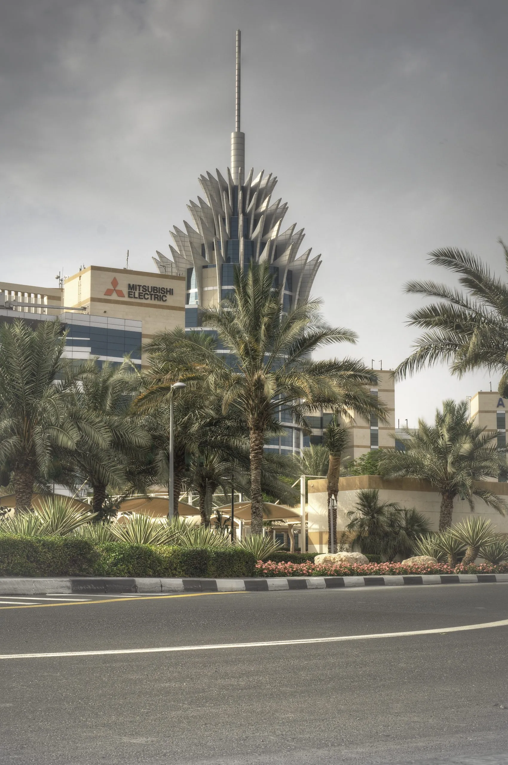 View across Dubai Silicon Oasis showing low-rise technology park buildings and residential blocks, photographed in 2015.