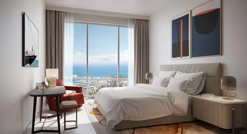 Render of a bedroom at Address Residences The Bay with a floor-to-ceiling window facing the sea