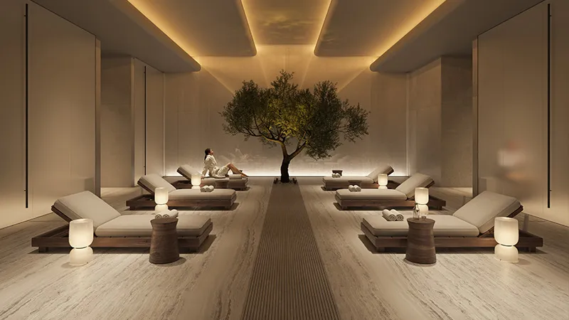 Render of a walk-in dressing room at Akala lined with backlit glass wardrobes and a round mirror at the end
