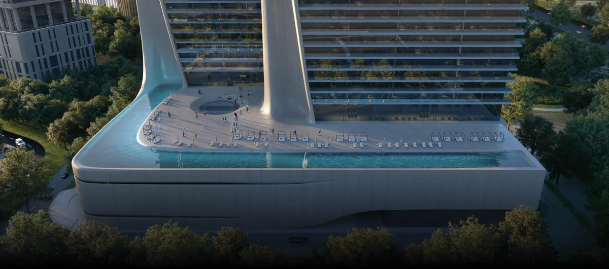 Aerial render of Akala's curved podium roof with a long blue pool, sun loungers and the bases of the two towers