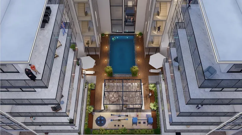 Overhead render of the courtyard at Arché Residence with the pool, pergola and seating between the two wings
