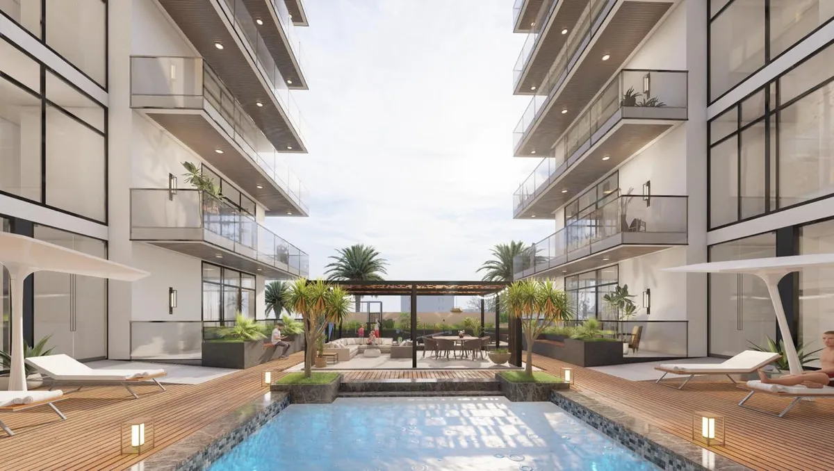 Render of the swimming pool, loungers and pergola in the central courtyard of Arché Residence