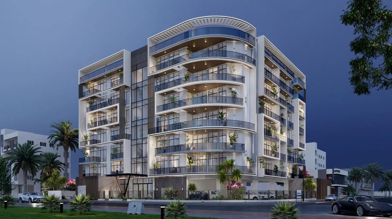 Evening render of Arché Residence in Dubai South, a seven-storey building with curved balconies on its corner
