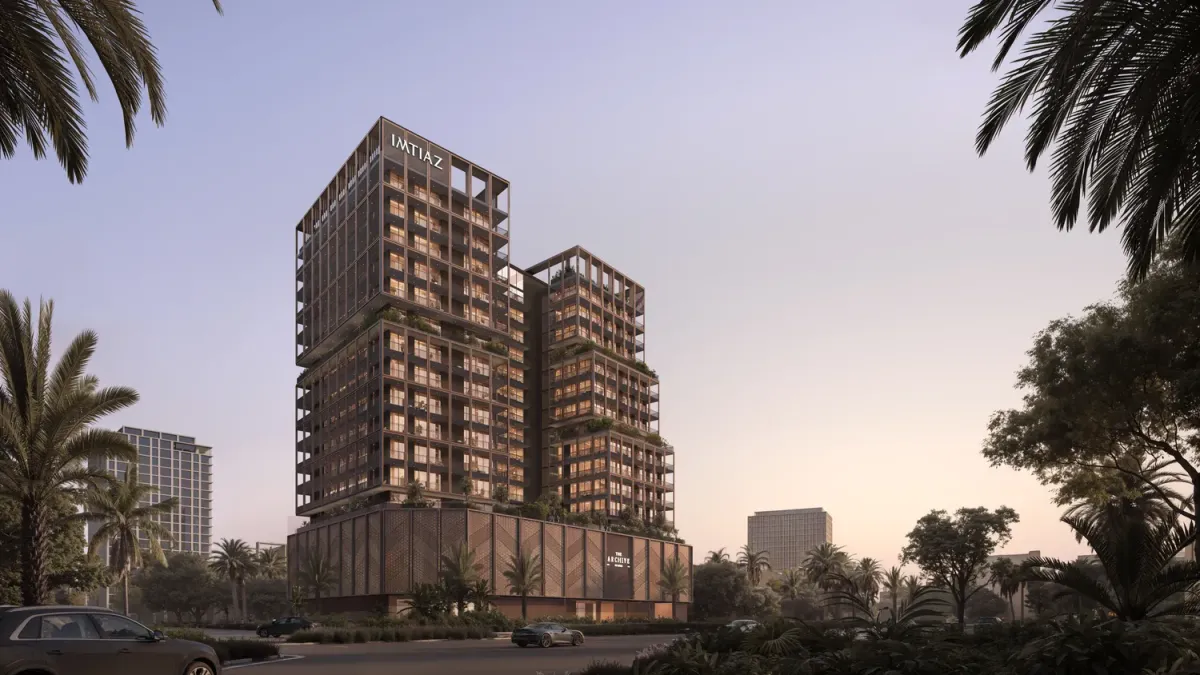 The Archive by Imtiaz towers in Dubailand Residence Complex at dusk