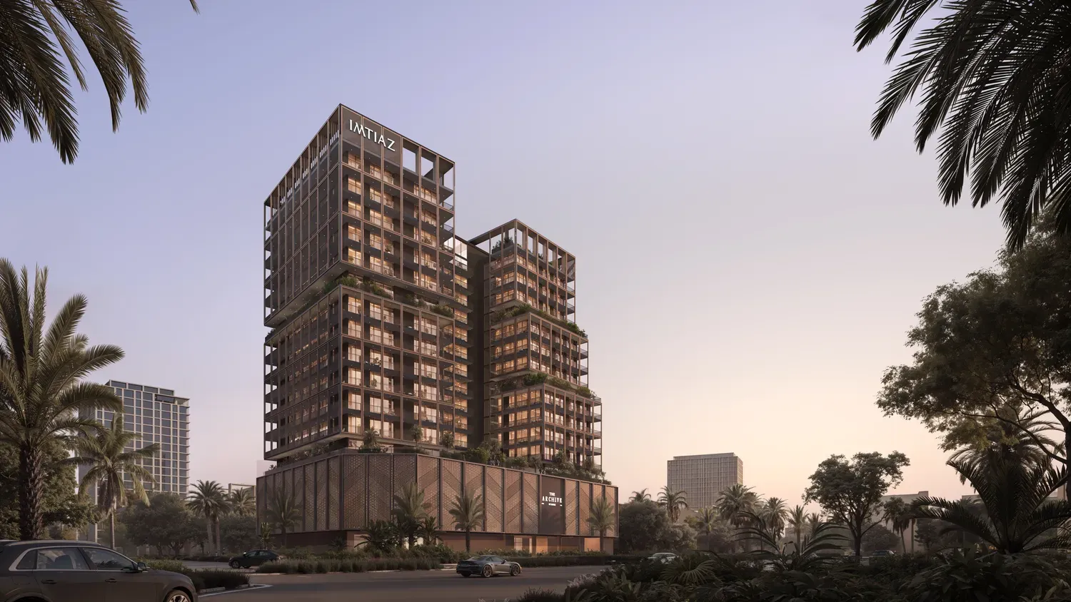 The Archive by Imtiaz towers in Dubailand Residence Complex at dusk