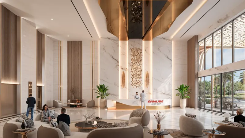 Aspirz entrance lobby with double-height ceiling and lounge seating