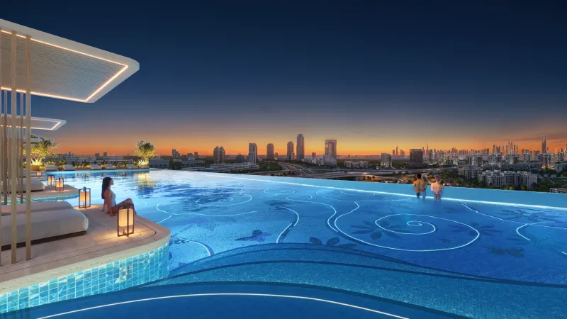 Aspirz infinity pool at dusk overlooking the Dubai skyline