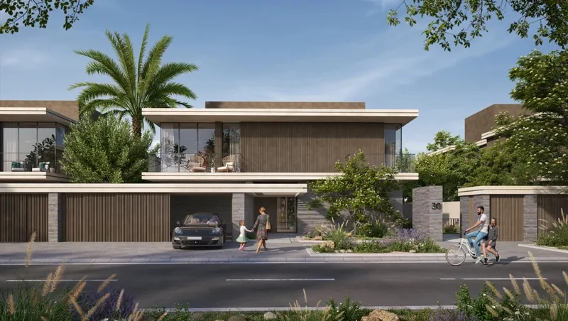 Render of Athlon villas along a tree-lined street with a cyclist and family walking