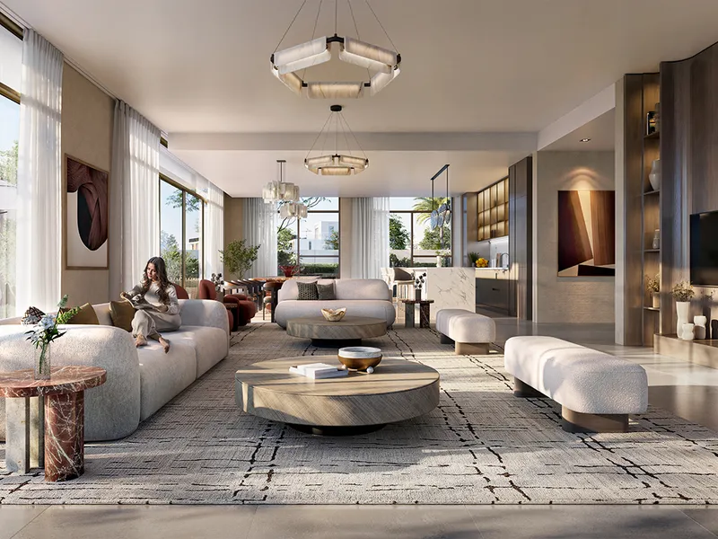 Interior render of an Avelia villa living room with sofas, pendant lights and garden views