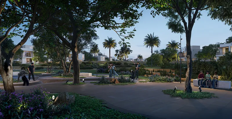 Render of residents walking along tree-shaded paths in a landscaped park at Avelia at dusk