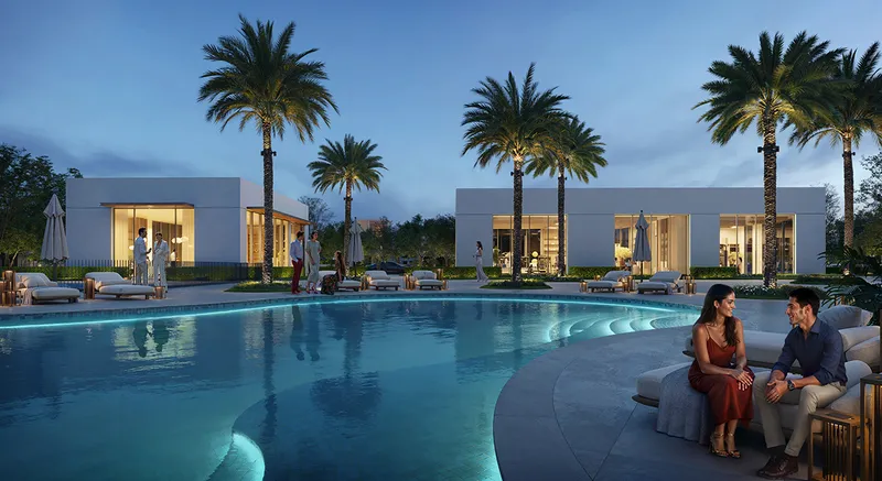 Render of the Avelia pool deck at dusk with lit pavilions and palm trees