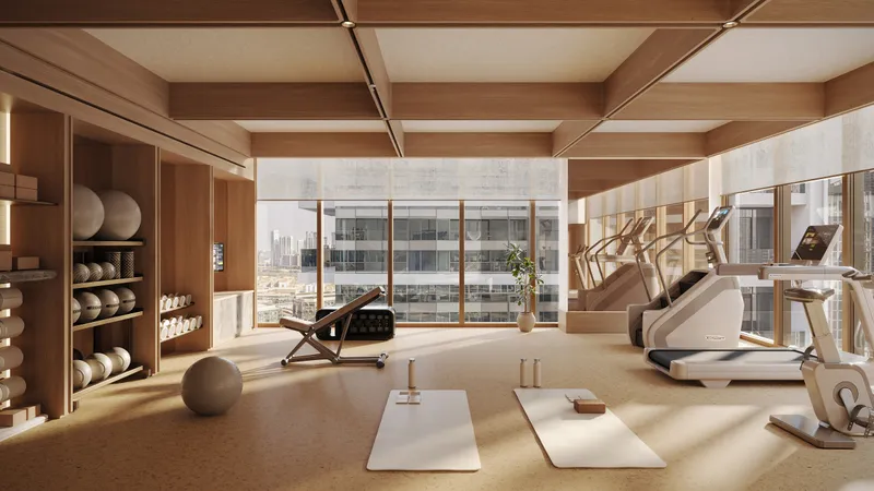 Timber-lined gym with cardio machines at Avenue Park Towers II