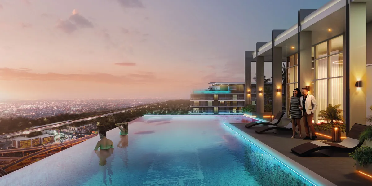 Rooftop infinity pool at sunset at Azizi Venice