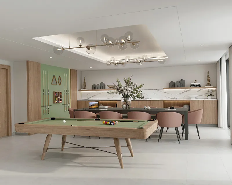 Clubhouse with a pool table and dining area at Azizi Wasel