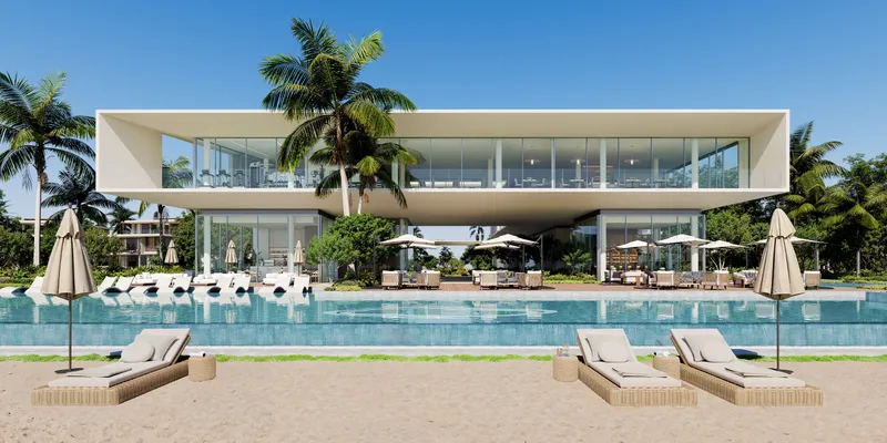 Bay Estate beach club with a long pool and loungers on the sand
