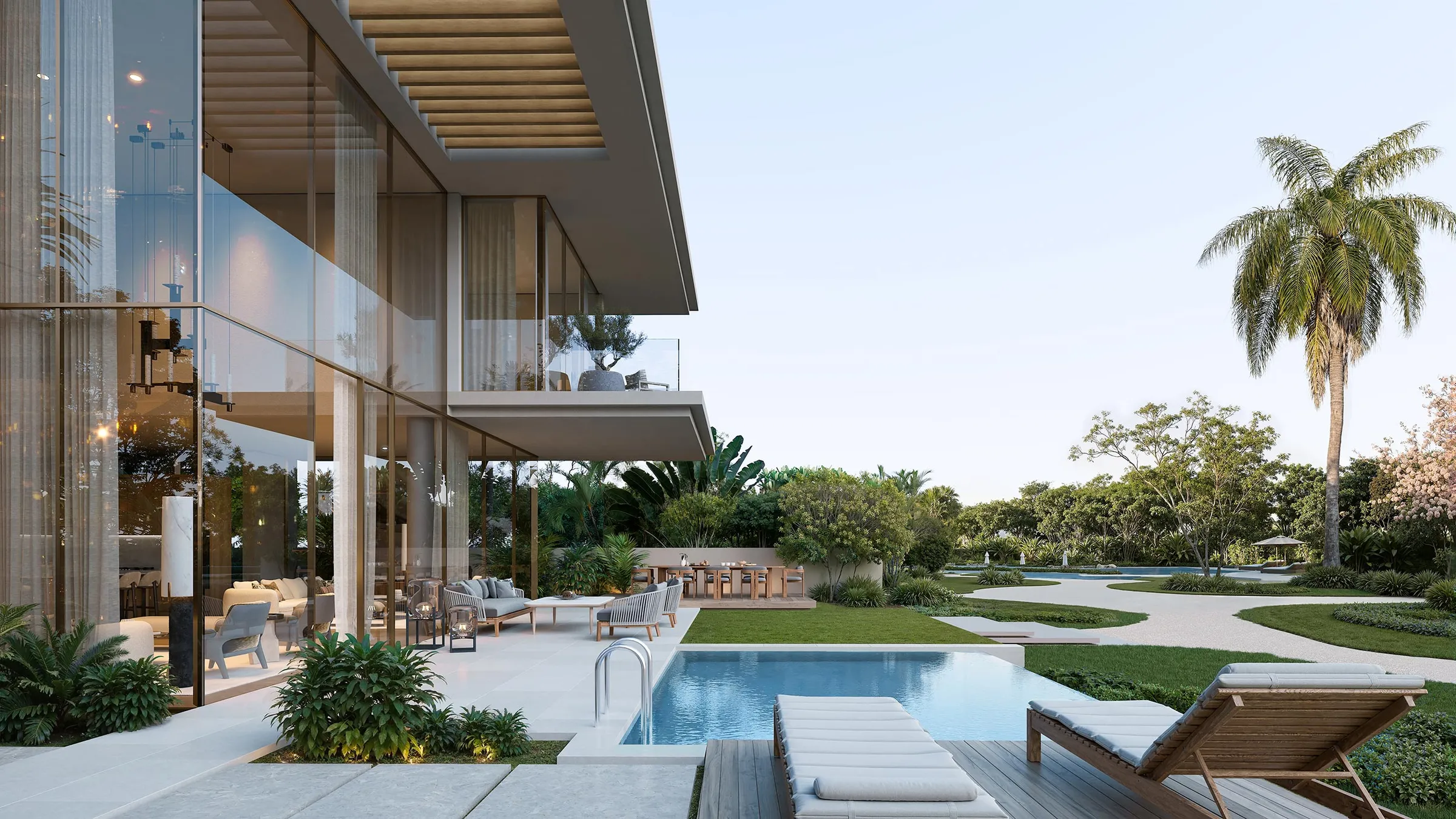 Bay Estate villa terrace with a private pool, loungers and landscaped garden on Dubai Islands
