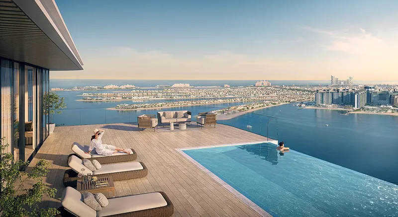 Render of the Bayview pool deck with loungers overlooking Palm Jumeirah