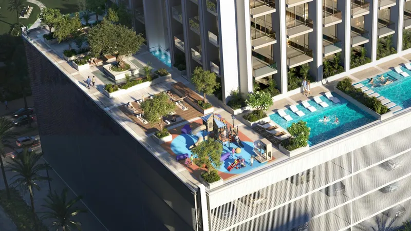 Aerial render of the fifth-floor amenity deck at Binghatti Etherea with pools and a children's play area