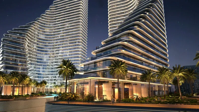 Render of the Binghatti Flare podium and lower terraces in the evening, with palms and pool