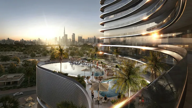 Podium pool deck at Binghatti Skyflame with palms and the Dubai skyline in the distance