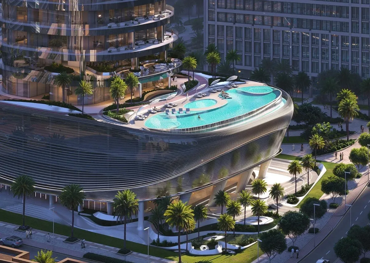 Aerial render of the pool deck on top of the Binghatti Skyblade podium, framed by palms