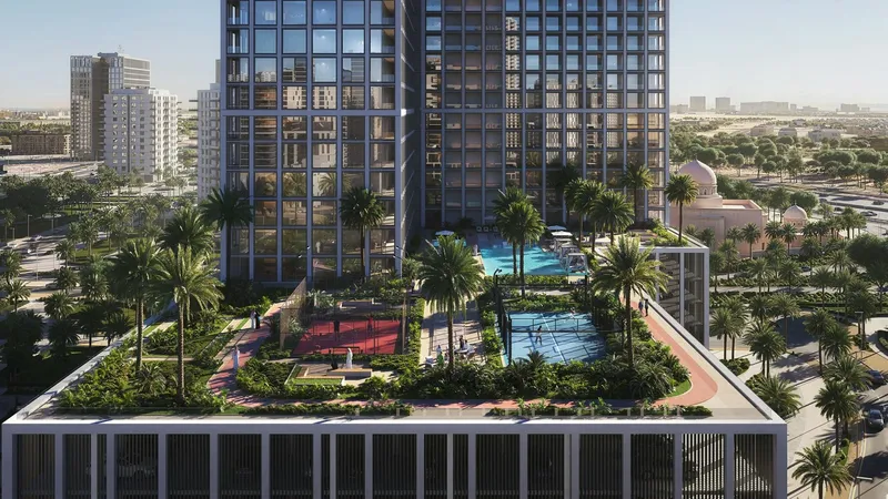 Render of the landscaped podium at Binghatti Vintage with pools, sports courts and palms