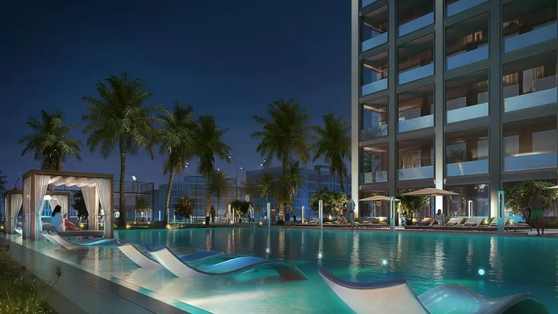 Render of the Binghatti Vintage podium pool and cabanas at night