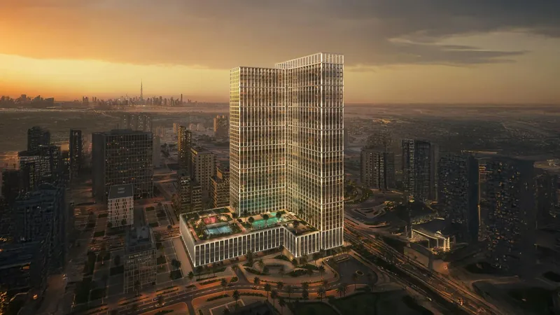 Computer-generated aerial render of the Binghatti Vintage tower in Majan at dusk, with its lit geometric facade and podium pool