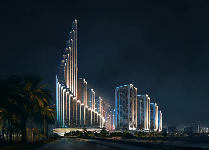 Night render from the road of the stepped, spiralling Vision Iconic tower at the edge of Binghatti City