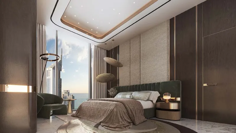 Apartment bedroom with floor-to-ceiling windows and skyline views at Burj Azizi