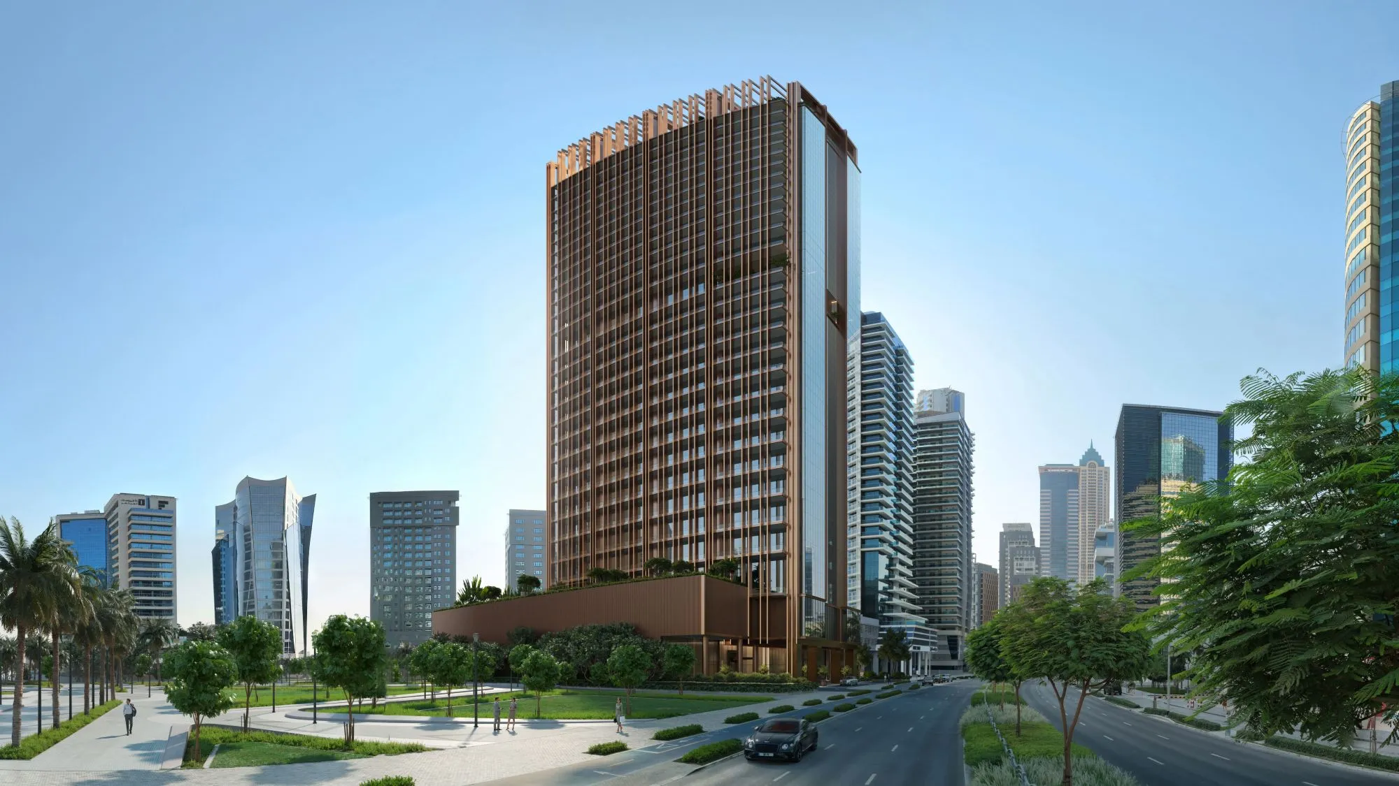 Burj Capital office tower with a bronze-toned facade above a landscaped boulevard in Business Bay