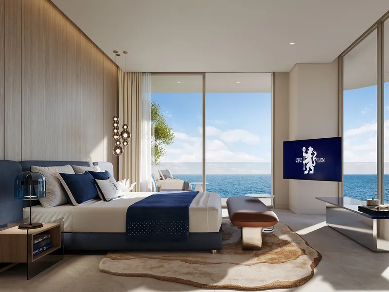 Bedroom at Chelsea Residences with full-height glazing and a sea view