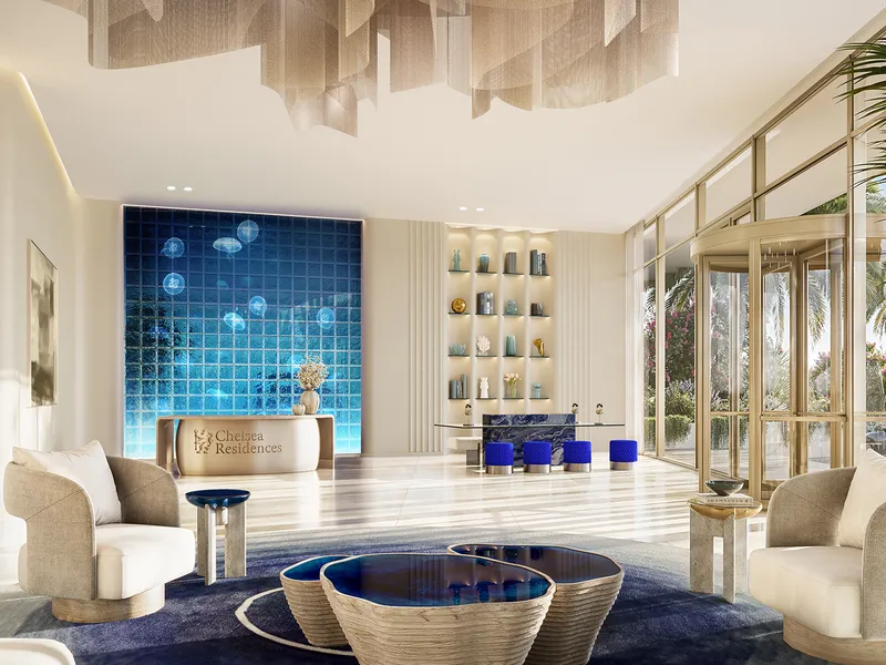 Chelsea Residences lobby lounge with a blue feature wall and seating