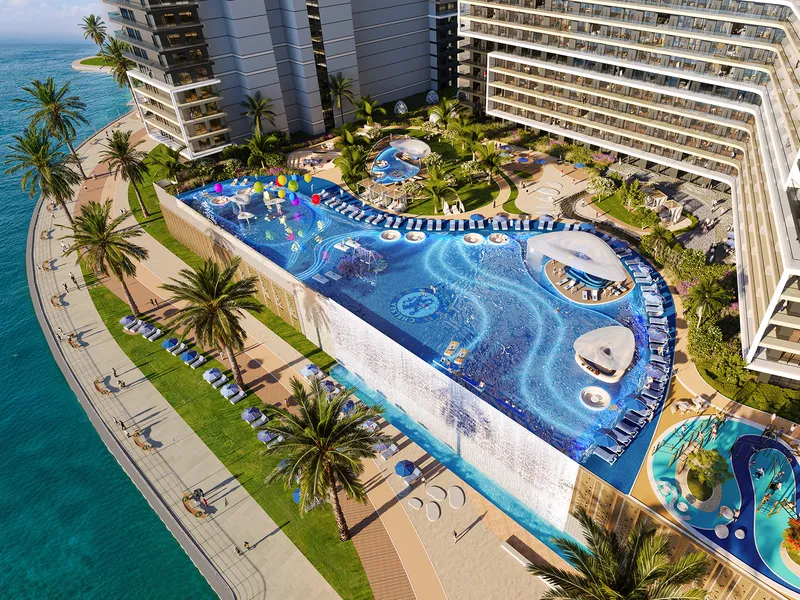 Aerial view of the Chelsea Residences infinity pool and beach along the waterfront