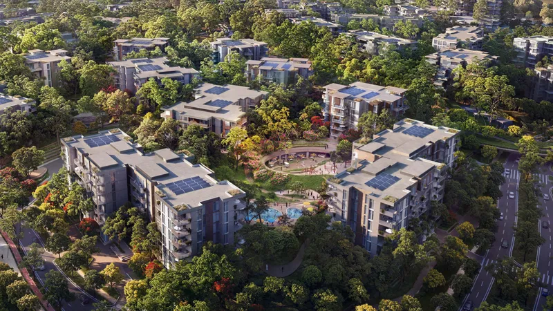 Aerial view of Cilia apartment buildings set in the Ghaf Woods forest