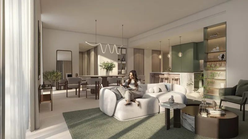 Open-plan living and dining room in a Cilia apartment