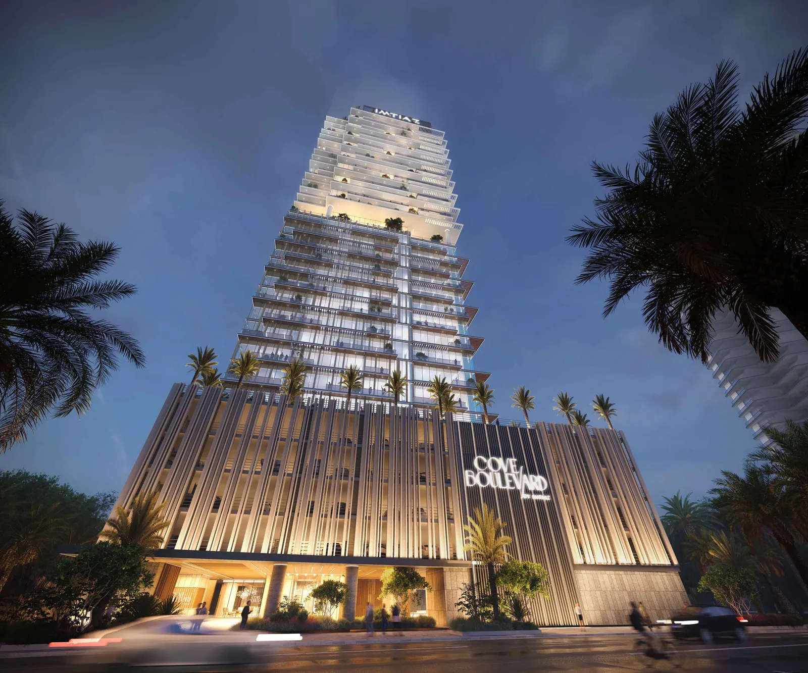 Cove Boulevard by Imtiaz tower and entrance at dusk
