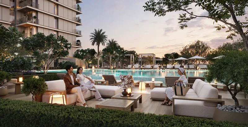 Render of residents in a landscaped lounge beside the Creek Haven pool at sunset