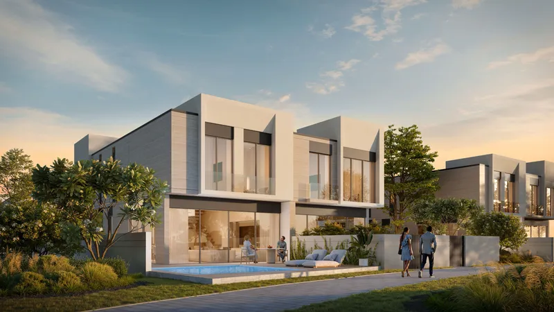 Garden side of 4 bedroom D-Villas with a private pool and lawn