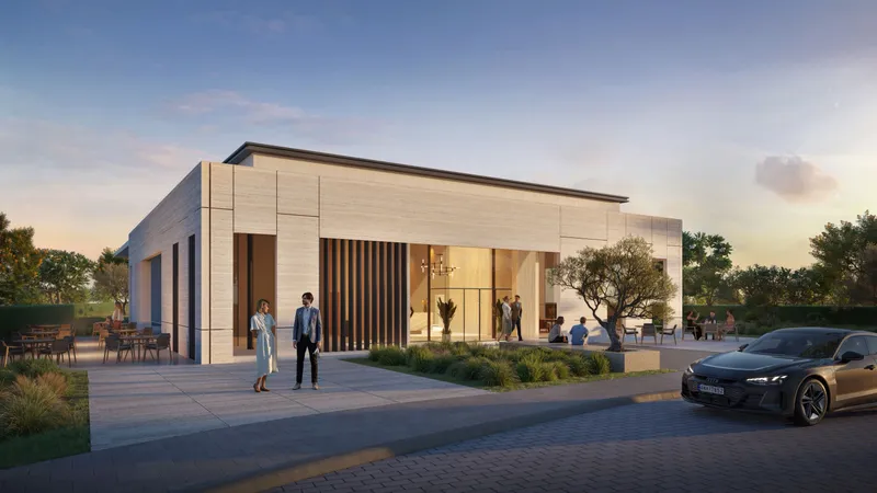 Single-storey D-Villa clubhouse building with landscaped entrance