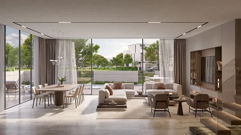 Open-plan living and dining room in a D-Villa with glass doors to the garden
