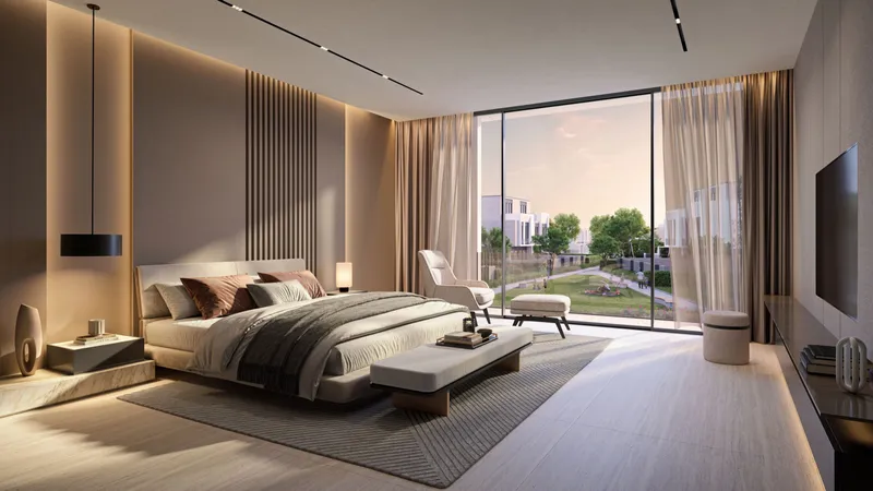 Master bedroom in a D-Villa with floor-to-ceiling windows onto greenery