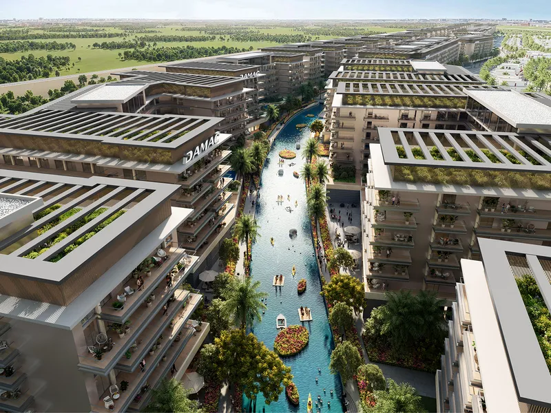 Aerial render of the river running between DAMAC Riverside Views apartment buildings with rooftop gardens