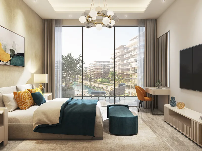 Bedroom in a DAMAC Riverside Views apartment with a large window over the community