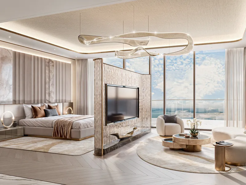 Bedroom and sitting area in a Safa Gate residence with floor-to-ceiling windows over the city