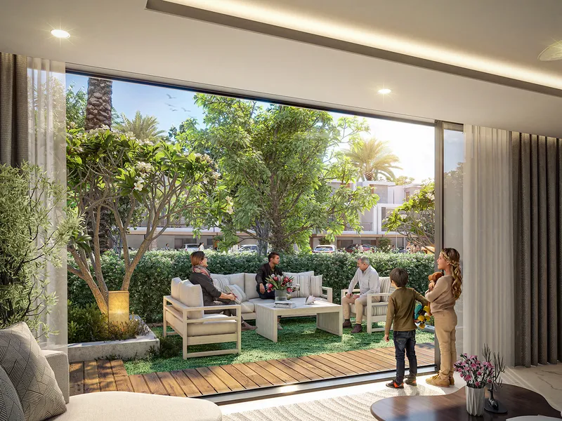 Ground-floor living room at Violet 4 opening onto a private garden with outdoor seating