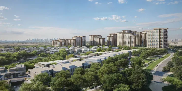 Daytime aerial across villas toward the Expo Valley Views apartment cluster