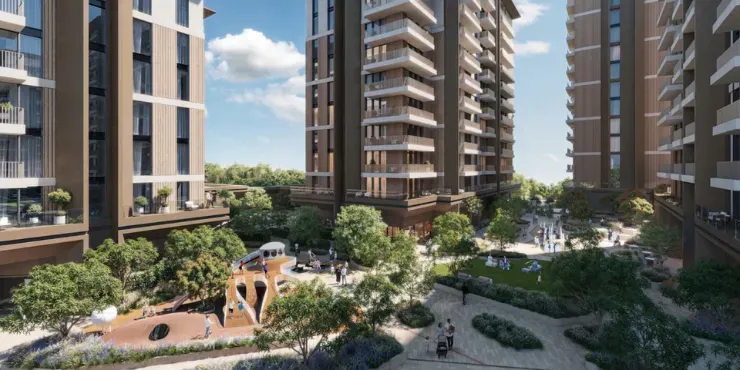 Landscaped courtyard and children play area between Expo Valley Views apartment blocks