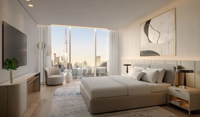 Bedroom in a DG1 apartment with a full-height window facing the Downtown Dubai skyline