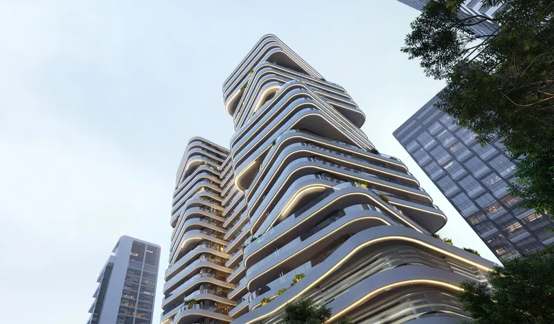 Looking up at the staggered, curved balconies of the DG1 tower